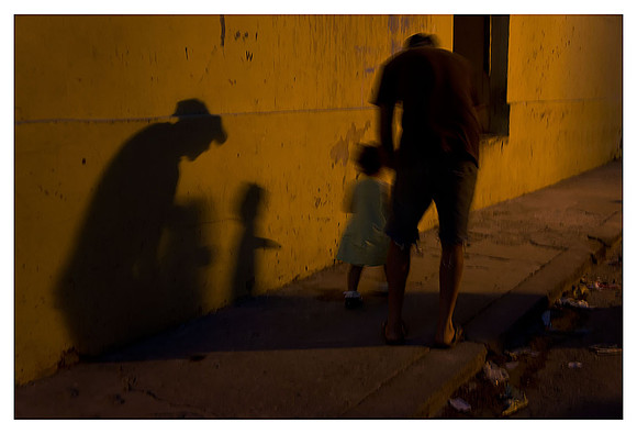 Father and Daughter Walking at Night